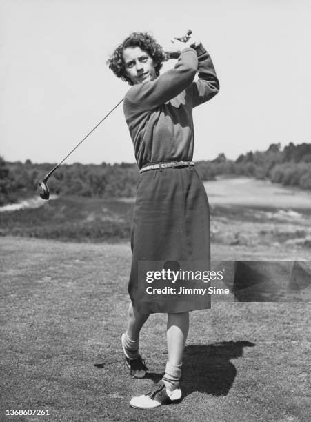 Dorothy Kirby of the United States and a member of the United States Curtis Cup team tees off during a practice round on 15th May 1948 at the...