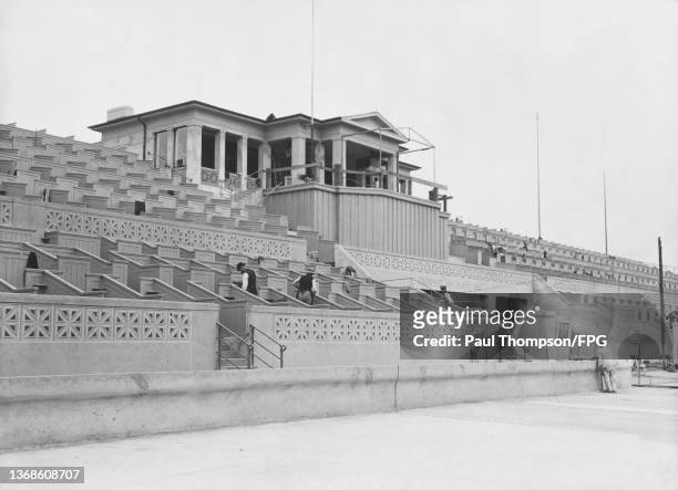 Labourers putting the final touches to the Royal Box at the Deutsches Stadion, constructed for the 1916 Summer Olympics, in the Deutsches Sportforum...