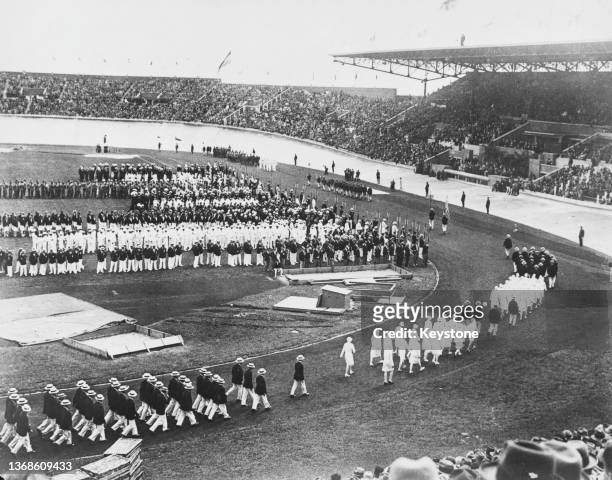 High angle view of the opening ceremony at the 1924 Summer Olympics, at the Stade olympique Yves-du-Manoir, the Olympic stadium for the 1924 Summer...