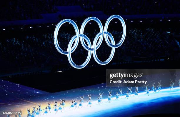 Large Olympic ring logo is seen inside the stadium as performer’s dance during the Opening Ceremony of the Beijing 2022 Winter Olympics at the...