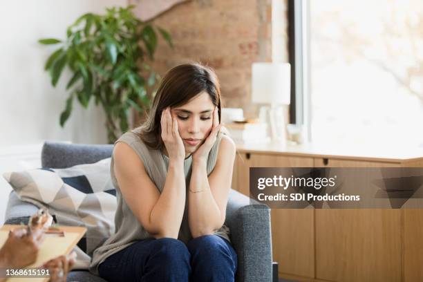 unrecognizable therapist waits for despairing client to speak - fragile stock pictures, royalty-free photos & images