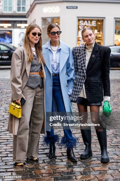 Influencer Annabel Rosendahl, wearing a light grey trench coat, light grey Jenas and a dark grey jacket by Acne Studios, a white shirt by Acne...