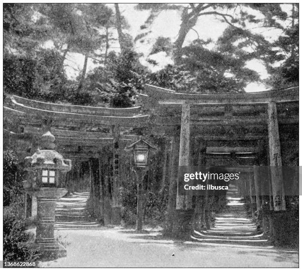 antique travel photographs of japan: torii gate - torii gate stock illustrations