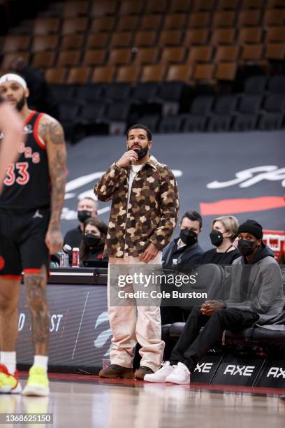 Toronto rapper Drake, takes in the NBA game between the Toronto Raptors and the Chicago Bulls at Scotiabank Arena on February 3, 2022 in Toronto,...