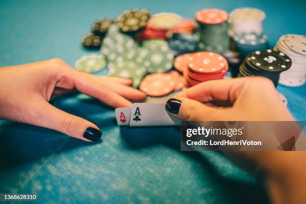 woman hand revealing two aces - card table stock pictures, royalty-free photos & images