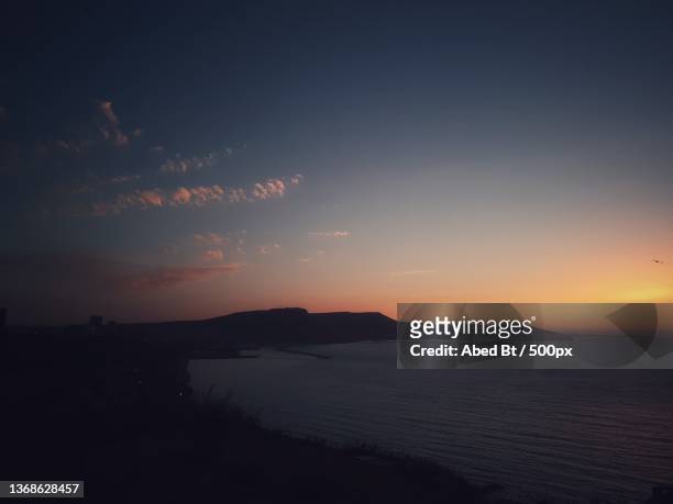 sunset in oran,scenic view of sea against sky at sunset - oran stock pictures, royalty-free photos & images
