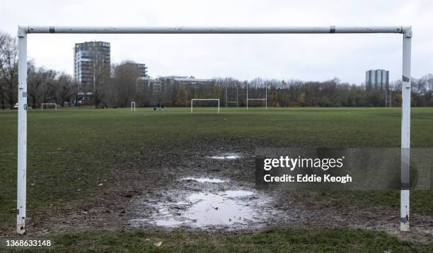 Muddy pitch is seen at Hackney Marshes on December 12, 2021 in London, England.