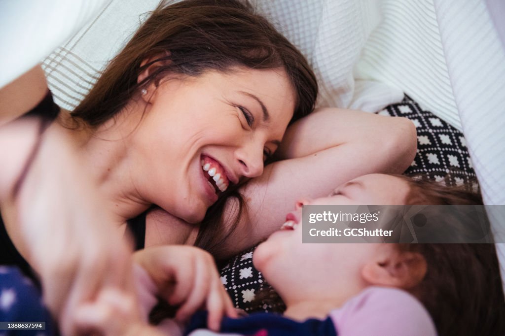 Playful Toddler with her Mother