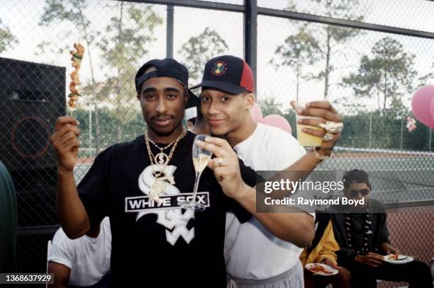 Rapper Tupac Shakur and actor Khalil Kain poses for photos during the First Annual 'How Can I Be Down' music conference. Digital Underground's Shock...