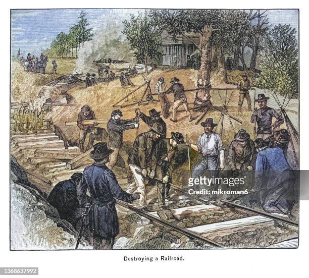 old engraved illustration of union general william tecumseh sherman's march trough georgia (1864), destroying the confederate infrastructure - the bridges and railroads - general sherman stock pictures, royalty-free photos & images
