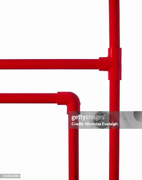 red plastic tubing - pvc stock pictures, royalty-free photos & images