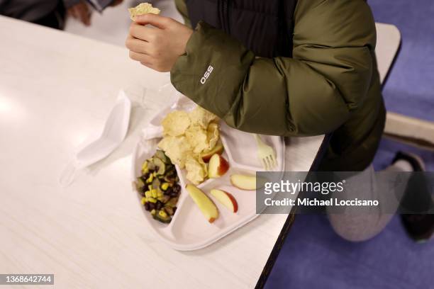 Student eats a vegan meal served for lunch at Yung Wing School P.S. 124 on February 04, 2022 in New York City. Starting today, the Department of...