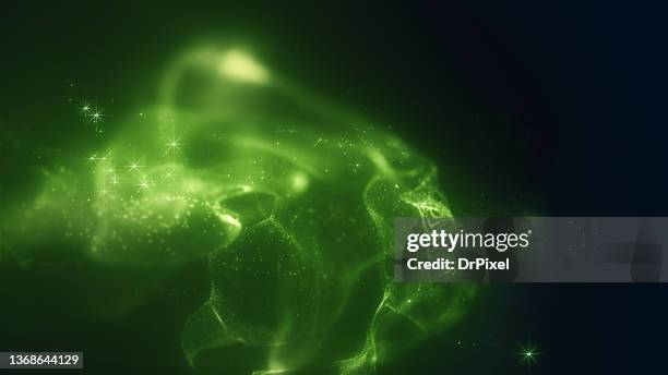 green fog and particles against dark background - liquid galaxy stock pictures, royalty-free photos & images