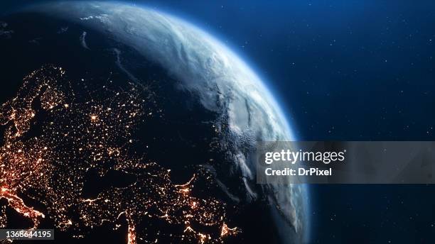 planet earth seen from space. city lights on the dark side - asia continent stockfoto's en -beelden