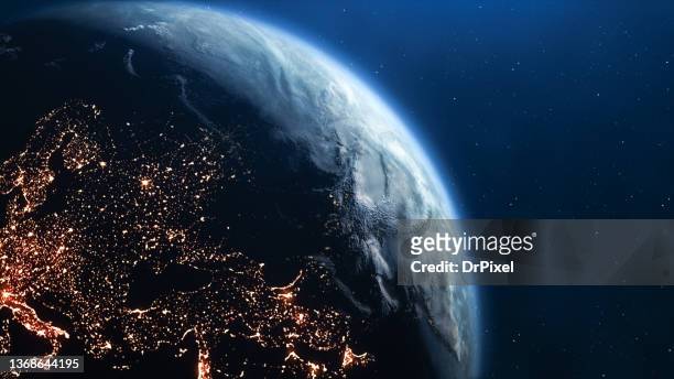 planet earth seen from space. city lights on the dark side - earth from space stock pictures, royalty-free photos & images