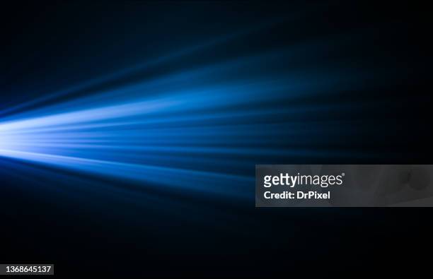 blue light - light beam fotografías e imágenes de stock