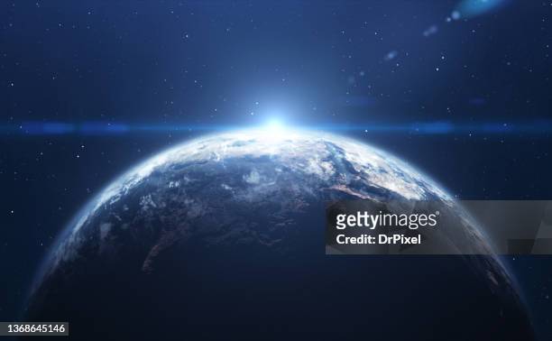 planet earth & rising sun - earth ストックフォトと画像