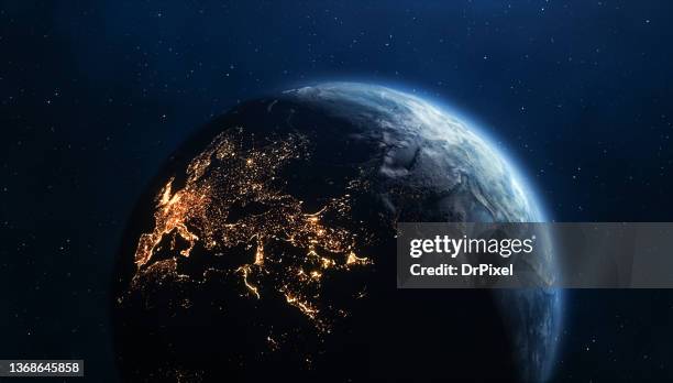 planet earth seen from space. city lights on the dark side - europa kontinent stock-fotos und bilder