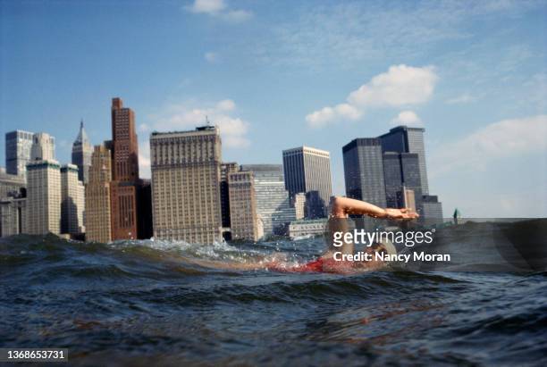 Swimmer Diana Nyad is photographed swimming in the Hudson River around lower Manhattan in preparation for her swim from Florida to Cuba from October...
