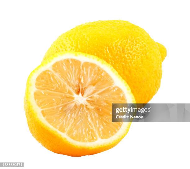 sliced lemon on white background - halved stockfoto's en -beelden