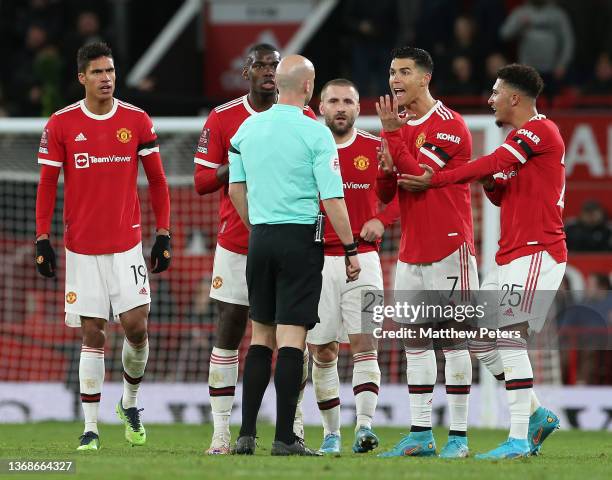 Paul Pogba, Cristiano Ronaldo and Jadon Sancho of Manchester United complain to Referee Anthony Taylor after Duncan Watmore of Middlesbrough scored a...