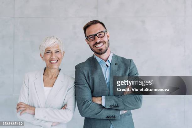 business people in the office. - two people standing stock pictures, royalty-free photos & images