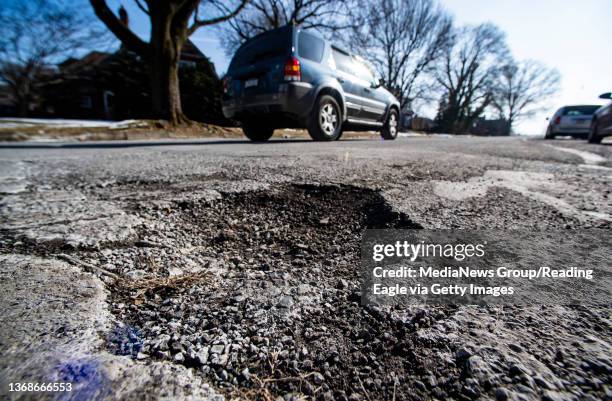 Spring Township, PA A pothole in the street in the 100 block of Harvard Blvd in the Lincoln Park neighborhood of Spring Township Wednesday afternoon...