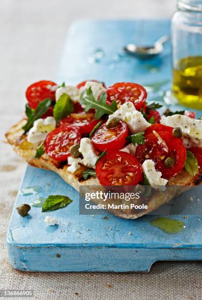 bruschetta with tomatoes and feta - tomate stock pictures, royalty-free photos & images