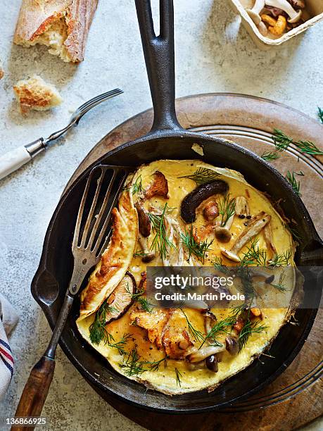 wild mushroom omelette in pan - fooding stock pictures, royalty-free photos & images