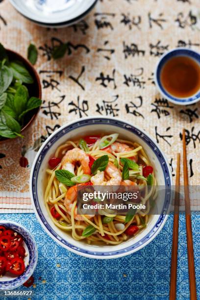 prawn noodles with mint and chilli - noodles stock pictures, royalty-free photos & images