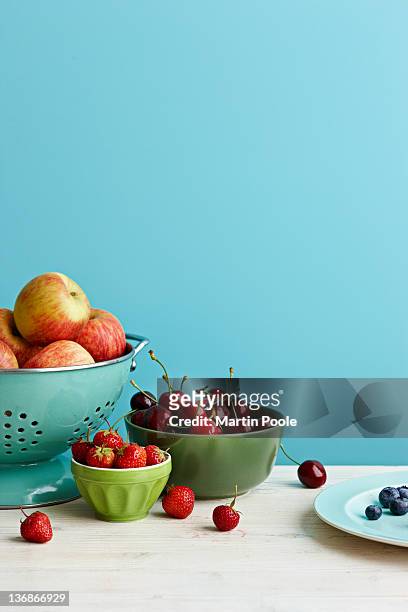 fresh orchard fruit on table - apple plate stock pictures, royalty-free photos & images