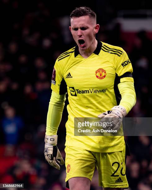 Dean Henderson of Manchester United makes a save in the penalty shoot out during the Emirates FA Cup Fourth Round match between Manchester United and...