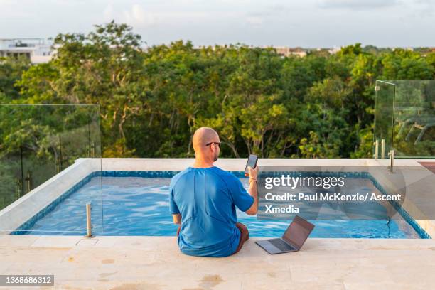 Working From Home Pool Computer Work From Home Pool Photos and Premium High Res Pictures - Getty Images