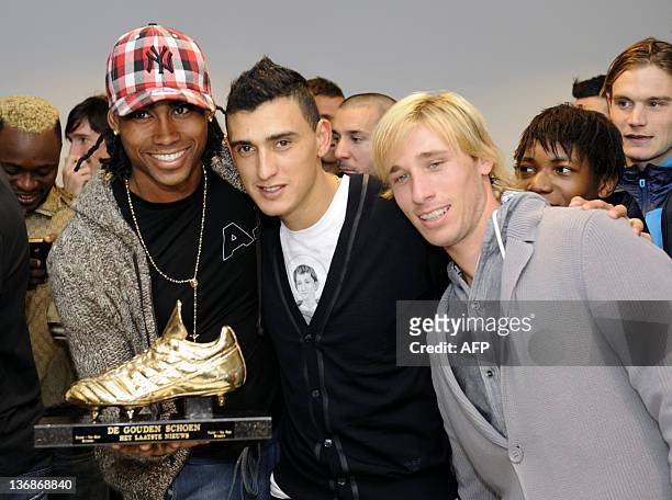 Anderlecht's Brazilian football player Kanu , Anderlecht's Argentine Matias Suarez, winner of Golden Shoe, and Anderlecht's Argentine Lucas Biglia...