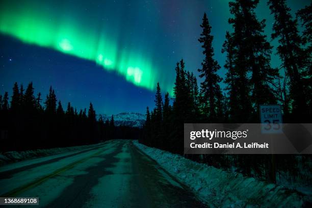 northern lights over a road - nasa curiosity stock pictures, royalty-free photos & images