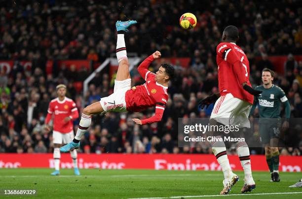 Cristiano Ronaldo of Manchester United attempts a shot with an overhead kick during the Emirates FA Cup Fourth Round match between Manchester United...