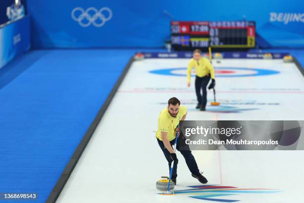 Oskar Eriksson and Almida de Val of Team Sweden compete against Team Switzerland during the Curling Mixed Doubles Round Robin on Day 1 of the Beijing...
