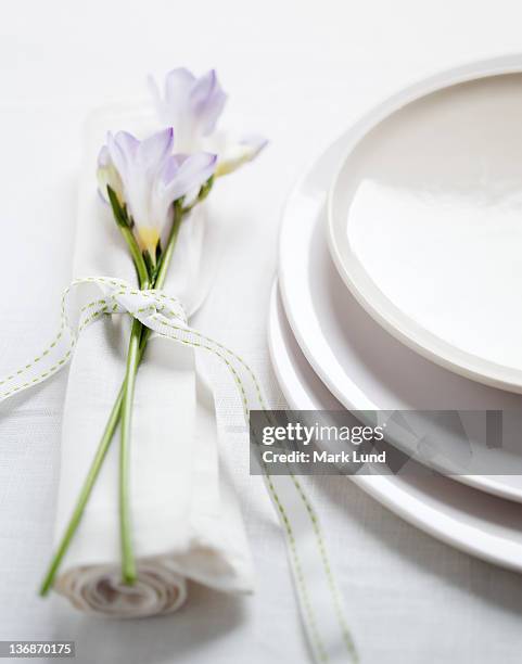 casual place setting with flowers and ribbon - freesia flowers stock pictures, royalty-free photos & images