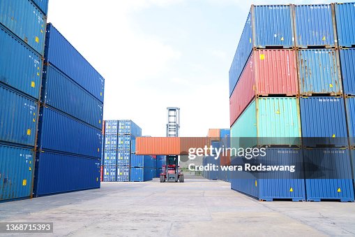 Empty Cargo Container Stack With Forklift Loading High-Res Stock Photo ...