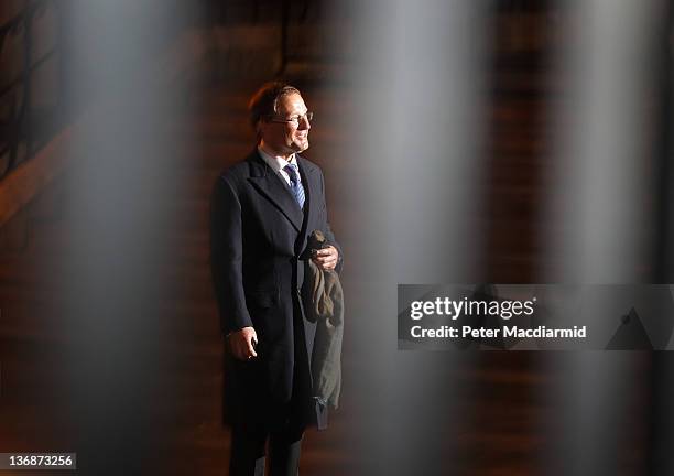 Owner of the Express Group of newspapers, Richard Desmond, is photographed through railings as he leaves The High Court after giving evidence to The...