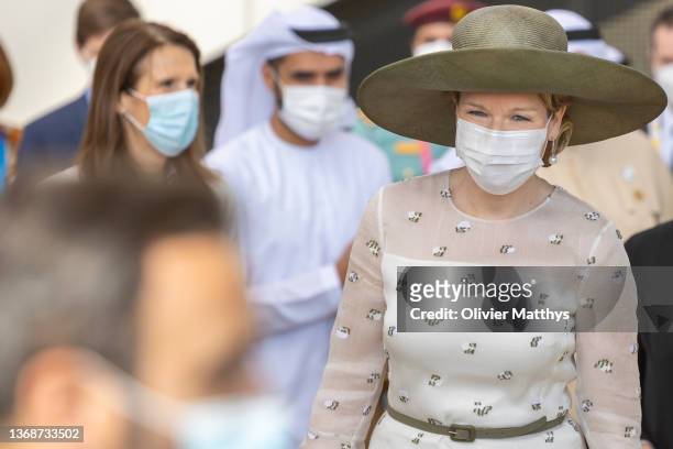 Queen Mathilde of Belgium followed by Foreign Minister Sophie Wilmès arrive at the Belgium National Day at the Dubai Expo 2020 on February 5, 2022 in...
