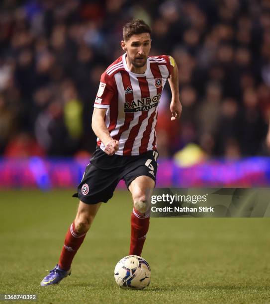 Chris Basham of Sheffield United runs with the ball during the Sky Bet Championship match between Birmingham City and Sheffield United at St Andrew's...