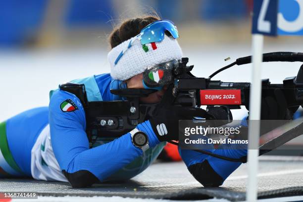 Dorothea Wierer of Team Italy shoots in the prone position during Mixed Biathlon 4x6km relay at National Biathlon Centre on February 05, 2022 in...