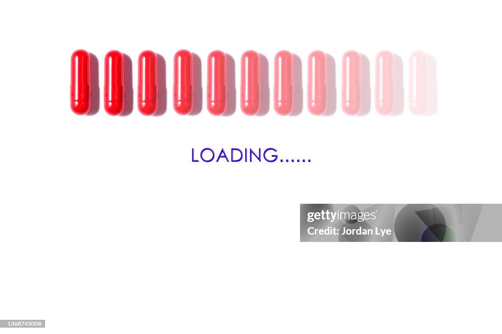 Red Capsule Loading