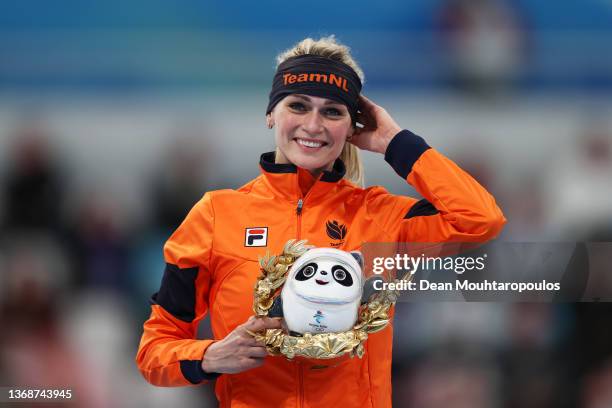 Gold medallist Irene Schouten of Team Netherlands poses during the Women's 3000m flower ceremony during the Women's 3000m on day one of the Beijing...