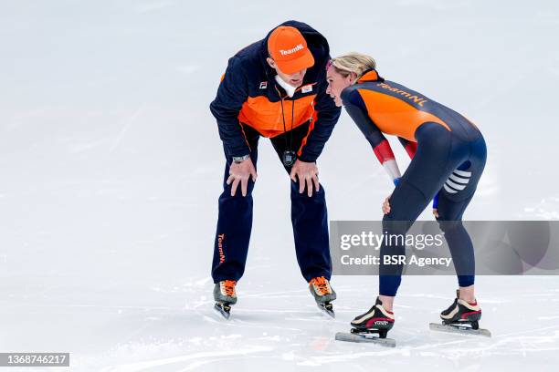 Coach Jillert Anema of Team Netherlands and Irene Schouten of Team Netherlands celebrate winning the gold medal during the Women's 3000m on day one...