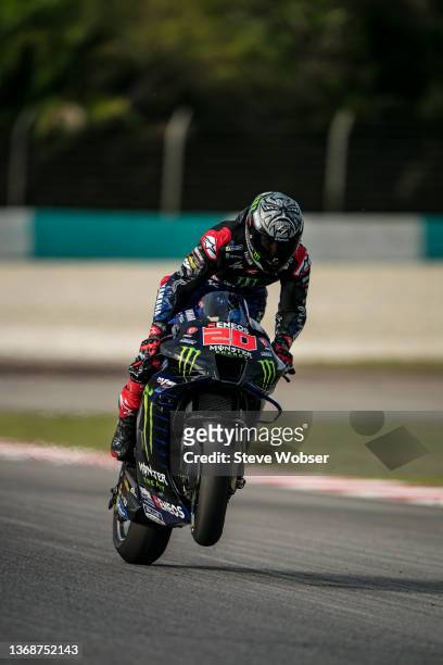 Fabio Quartararo of France and Monster Energy Yamaha MotoGP rides a wheelie on his last lap of day one during the MotoGP Pre-Season IRTA-Test at...