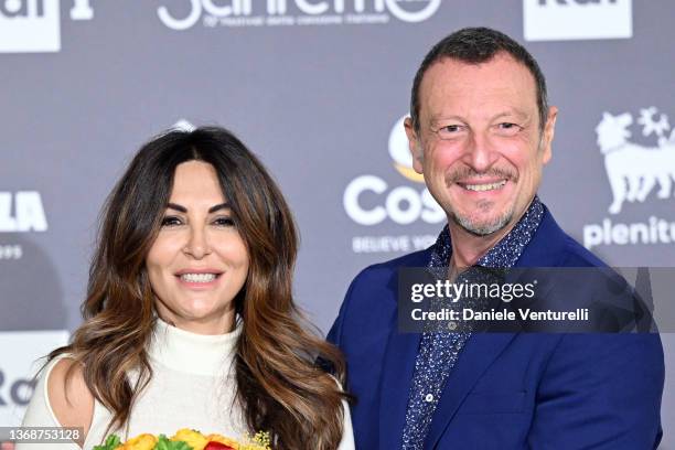 Sabrina Ferilli and Amadeus attend a photocall during the 72nd Sanremo Music Festival 2022 at Casinò on February 05, 2022 in Sanremo, Italy.