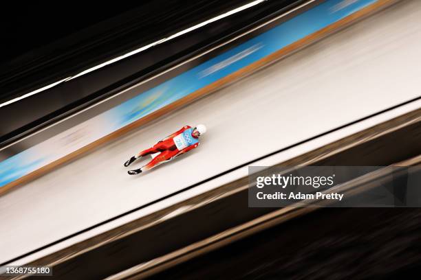 Seiya Kobayashi of Team Japan slides during the Men's Singles Luge heats on day one of the Beijing 2022 Winter Olympic Games at National Sliding...