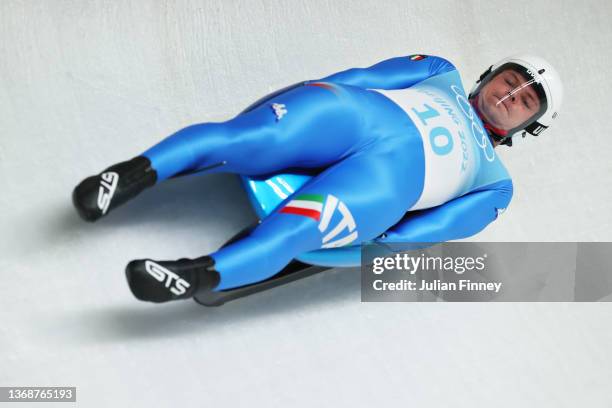 Dominik Fischnaller of Team Italy slides during the Men's Singles Luge heats on day one of the Beijing 2022 Winter Olympic Games at National Sliding...